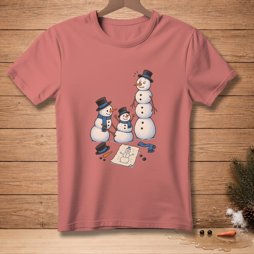 Snowman family with hat, scarf, and drawing of a snowman on a pink t-shirt.