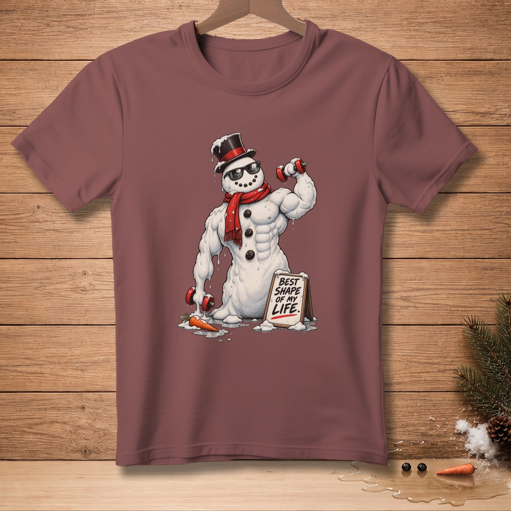 Muscular snowman in sunglasses and hat lifts weights, holding sign "Best Shape of My Life."