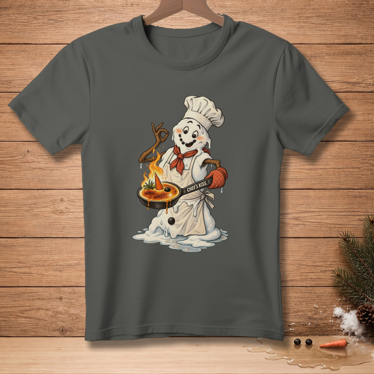 Snowman chef with a pan of crème brûlée and text "CHEF'S KISS."