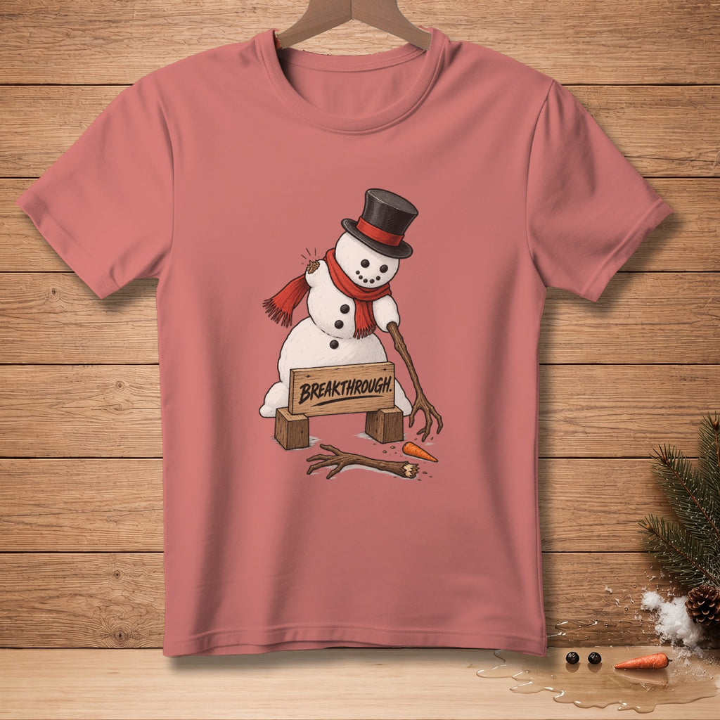 T-shirt graphic of a melting snowman breaking through a wooden sign reading "BREAKTHROUGH".