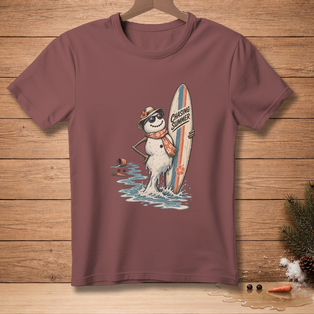 Melting snowman with sunglasses and scarf holding a surfboard with text.