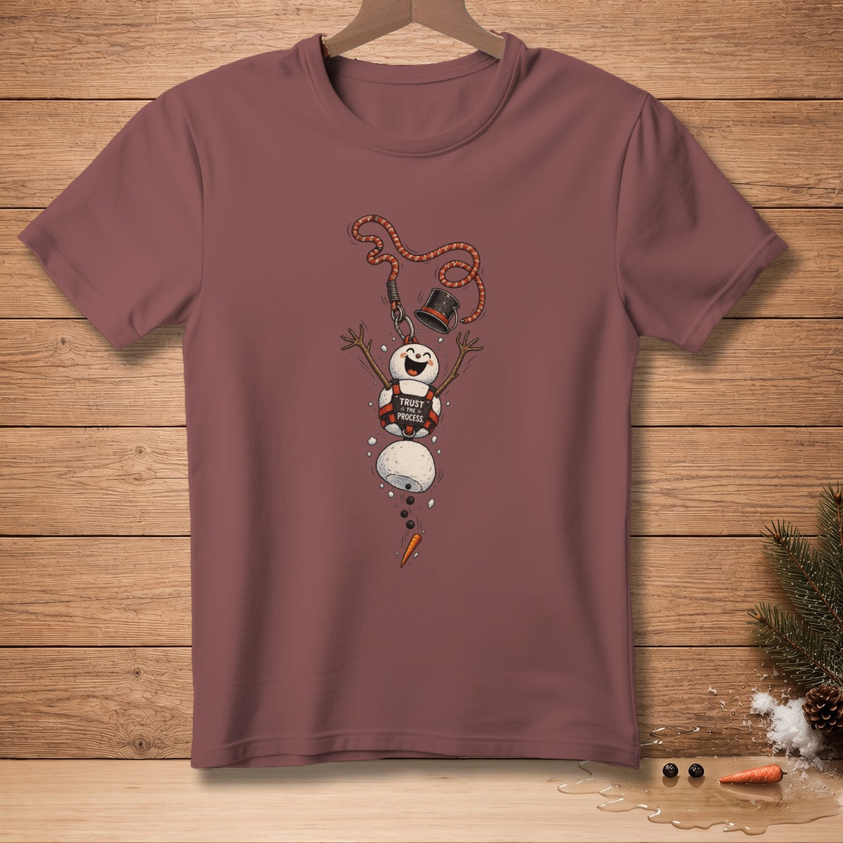 T-shirt with melting snowman graphic and "Trust the Process" text.