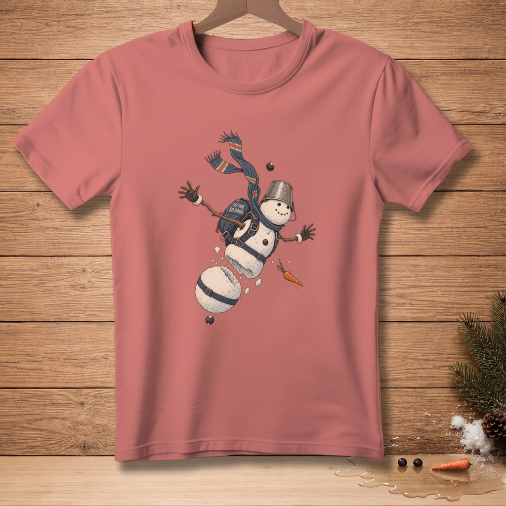 Pink t-shirt with graphic of a falling snowman with text "SO FAR SO GOOD".