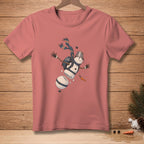 Pink t-shirt with graphic of a falling snowman with text "SO FAR SO GOOD".