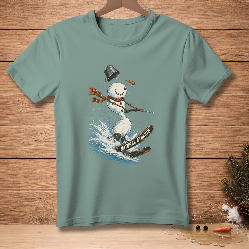 Snowman skiing on water, wearing scarf, with text "NATURAL ATHLETE."