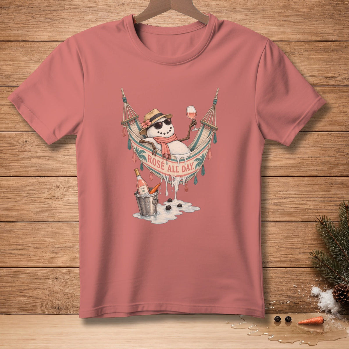 Snowman in a hammock with wine and "Rosé All Day" text.