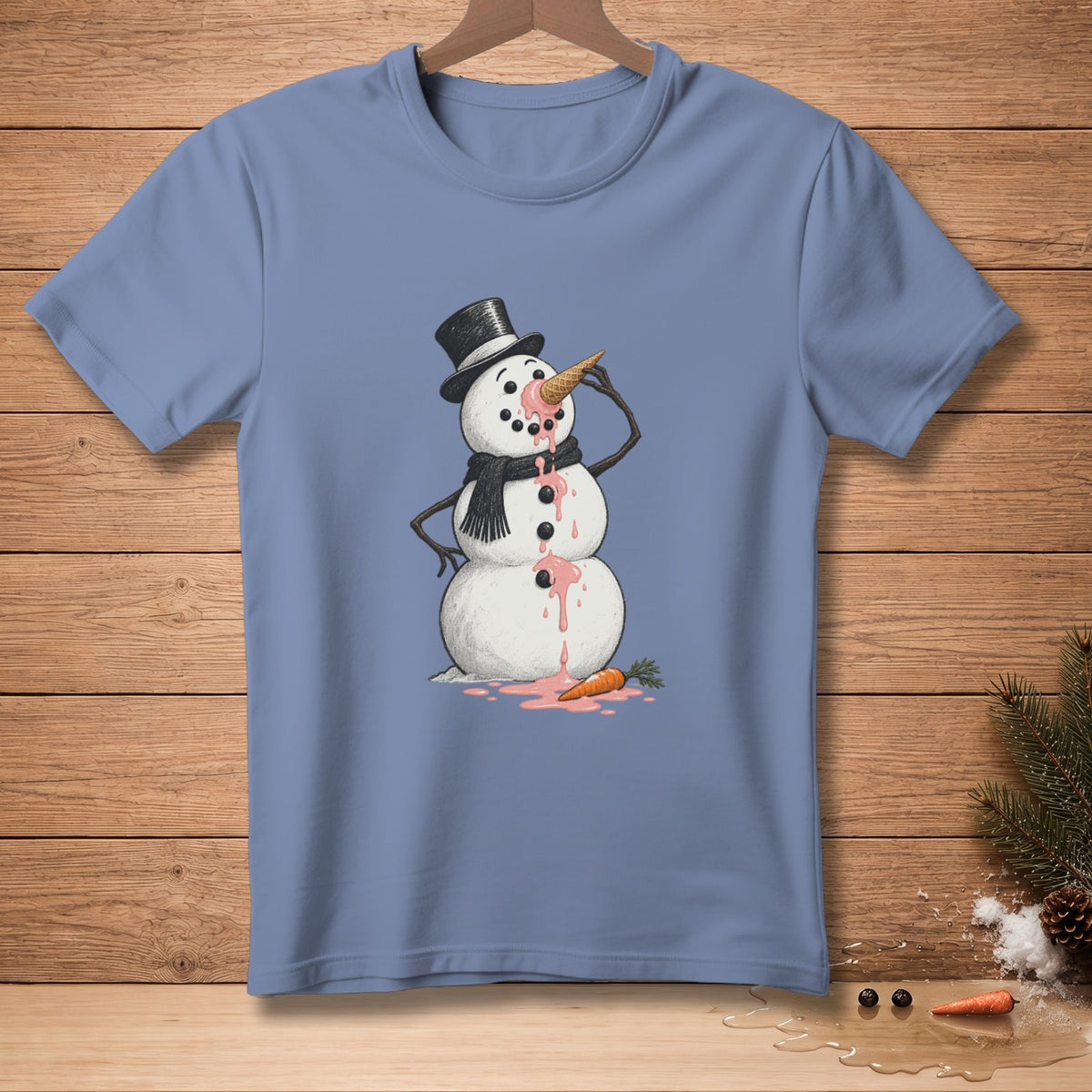Melting snowman with ice cream cone and carrot on blue t-shirt.