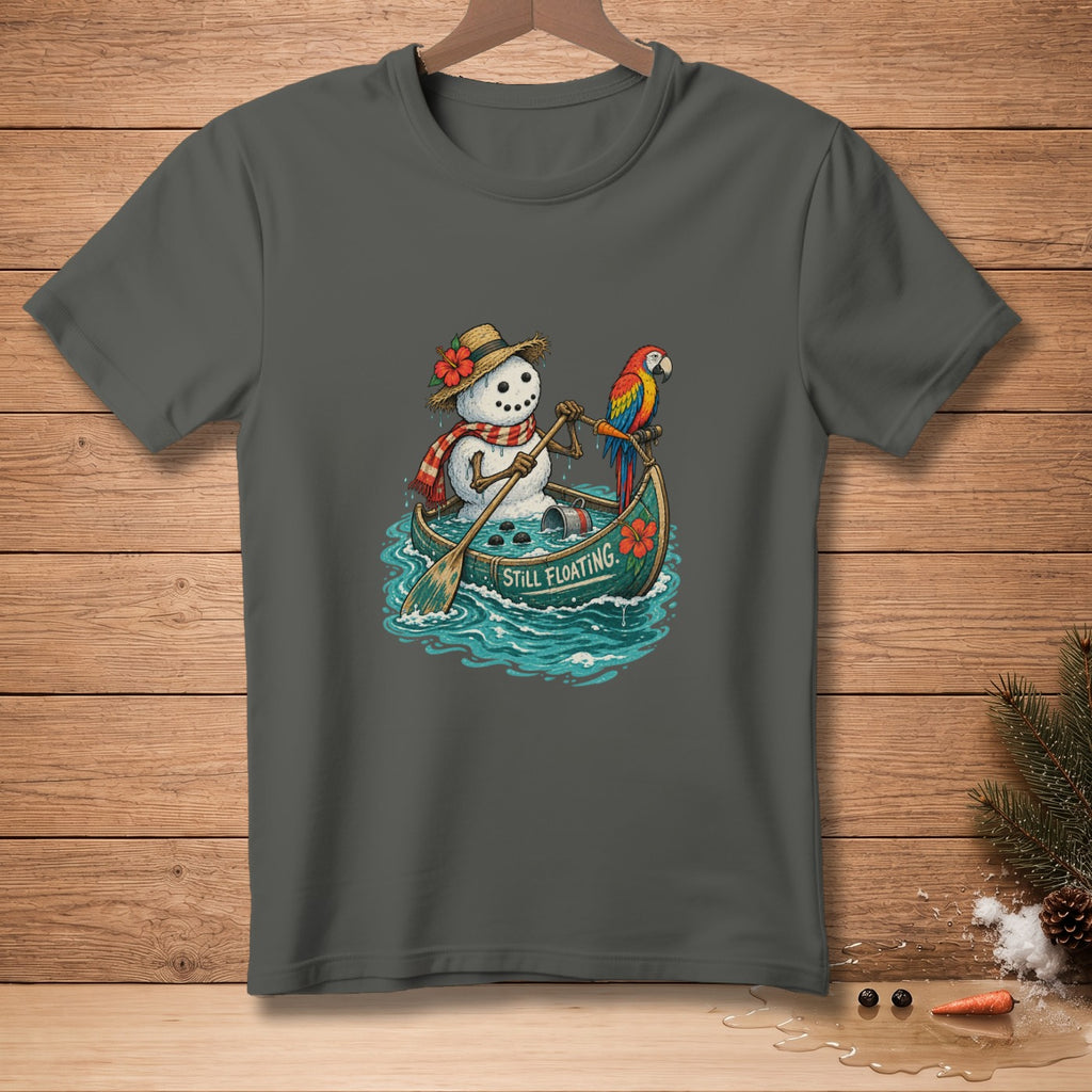 Snowman in a canoe with a parrot, text "STILL FLOATING."