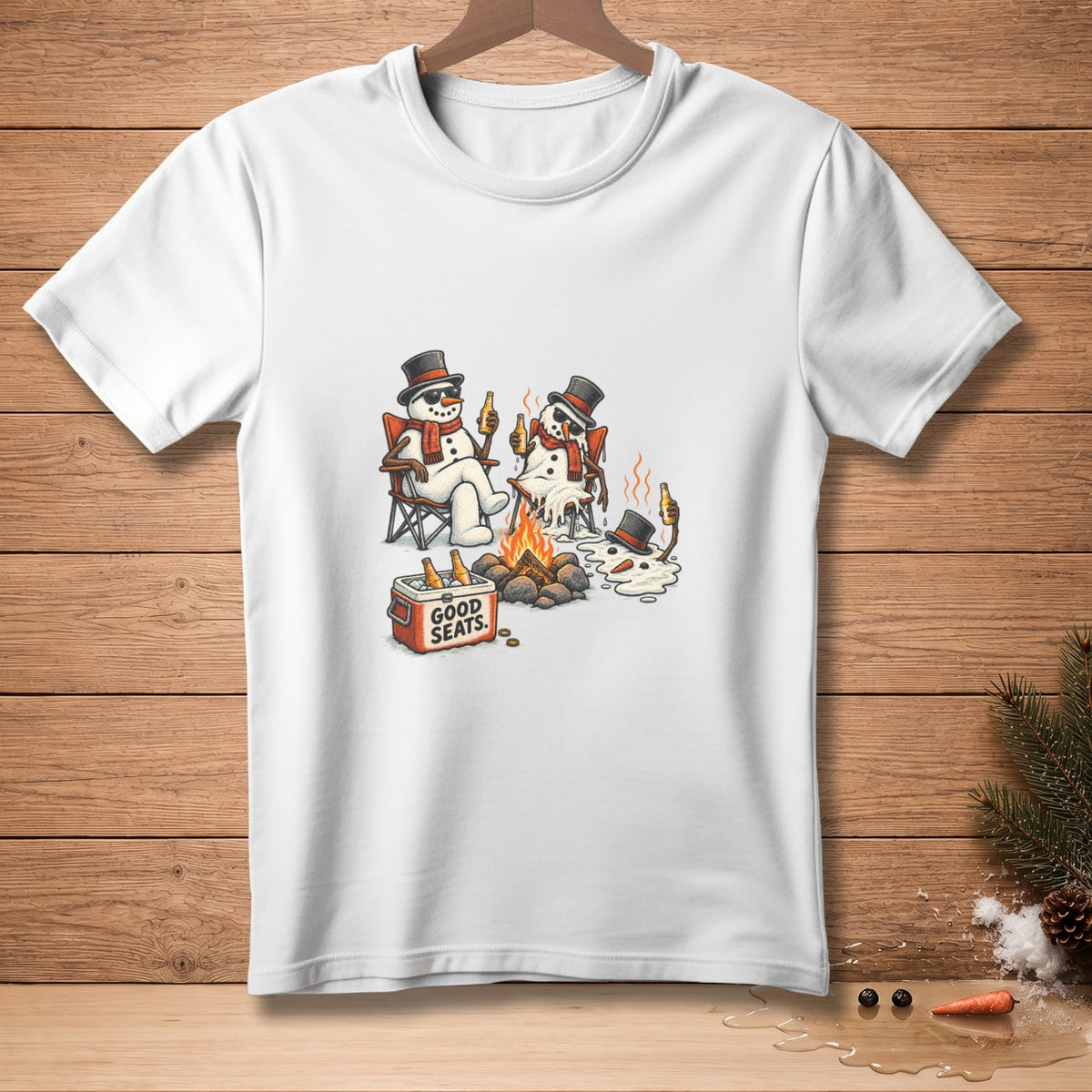 Three snowmen with top hats and scarves sit by a campfire, holding beer bottles.