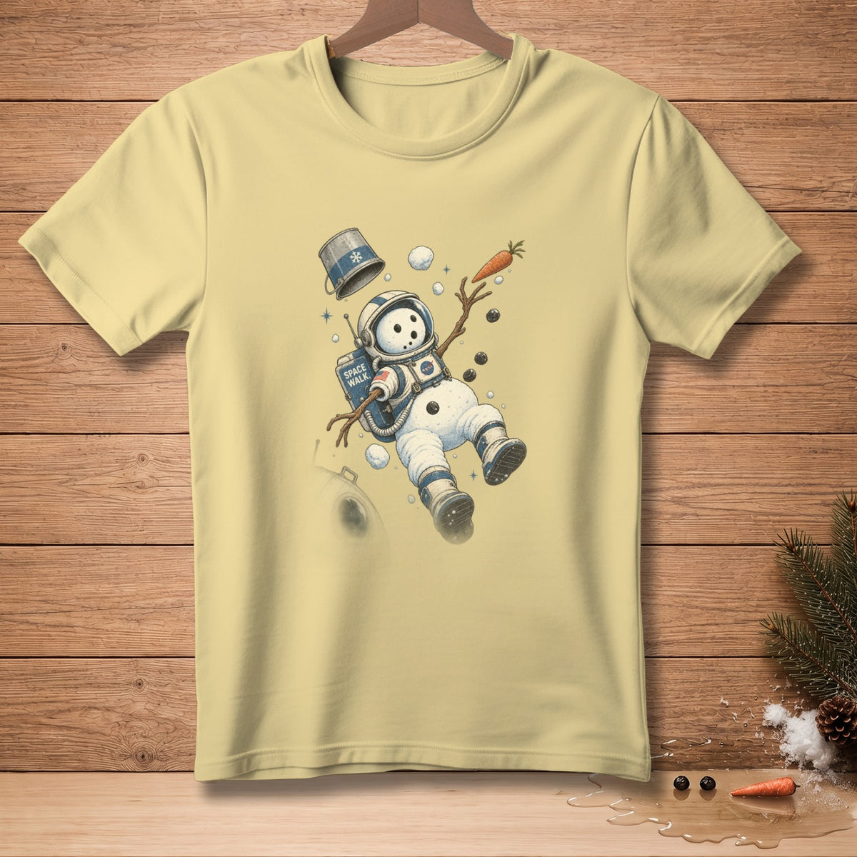 Light yellow t-shirt with a snowman astronaut design and "Space Walk" text.