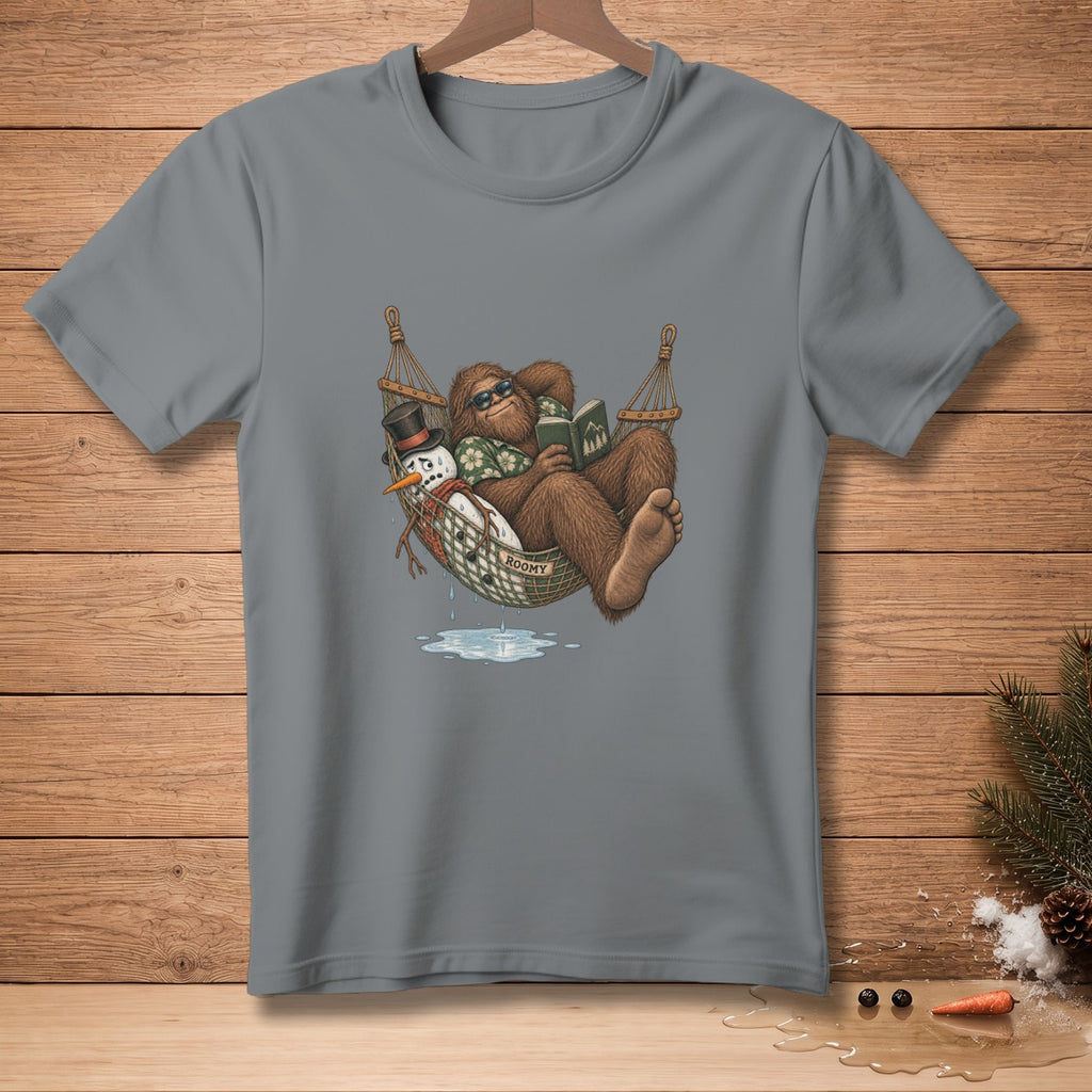 Bigfoot reads in a hammock next to a melting snowman and a sign that says "ROOMY".