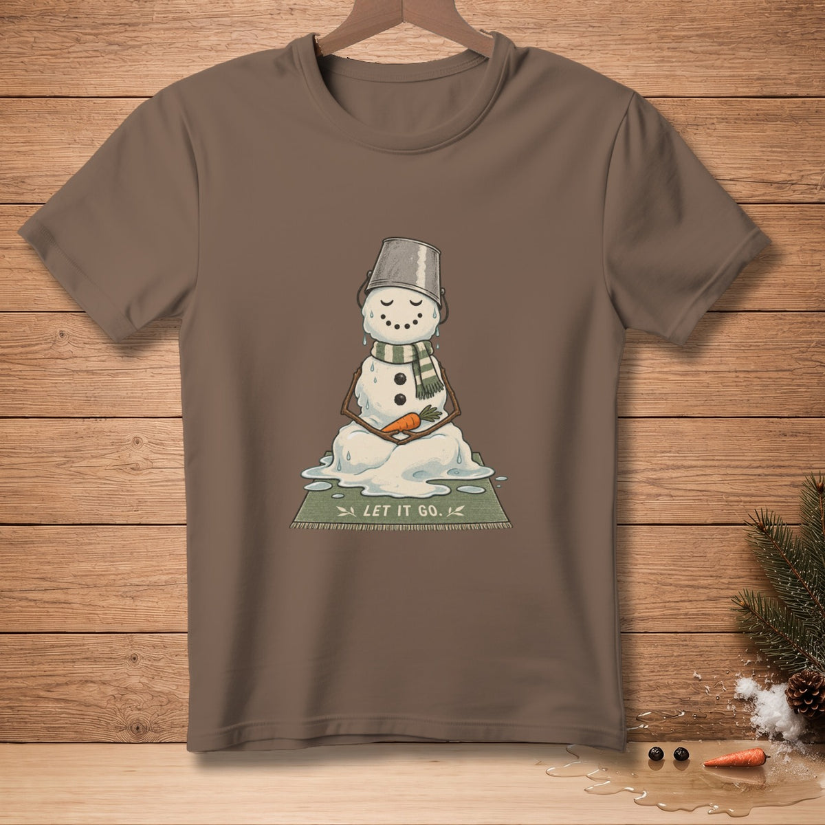 Melting snowman in meditative pose with text "LET IT GO."