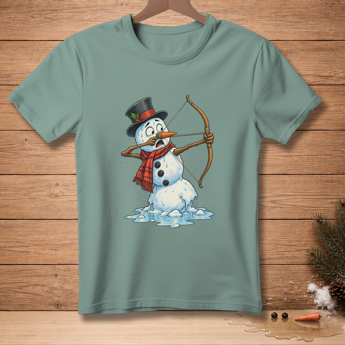 Snowman in a hat and scarf holding a bow and arrow, melting on a blue shirt.