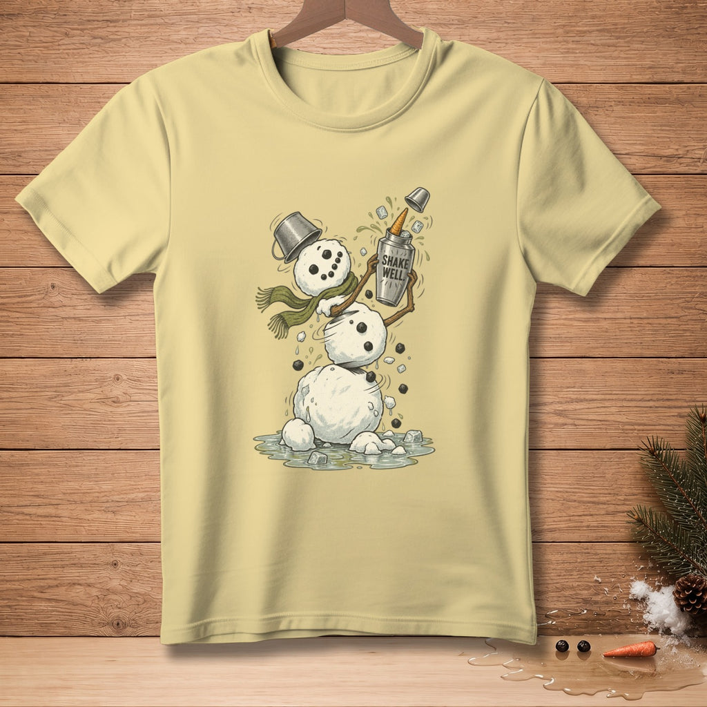 Light yellow t-shirt with melting snowman holding a shaker labeled "Shake Well".