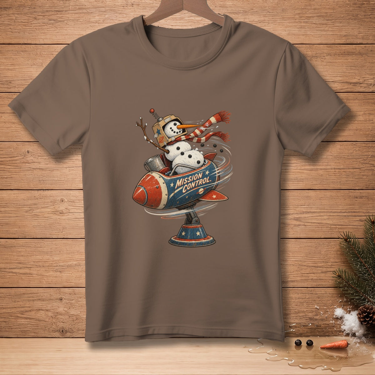 Snowman in a rocket with "Mission Control" text, wearing a scarf.