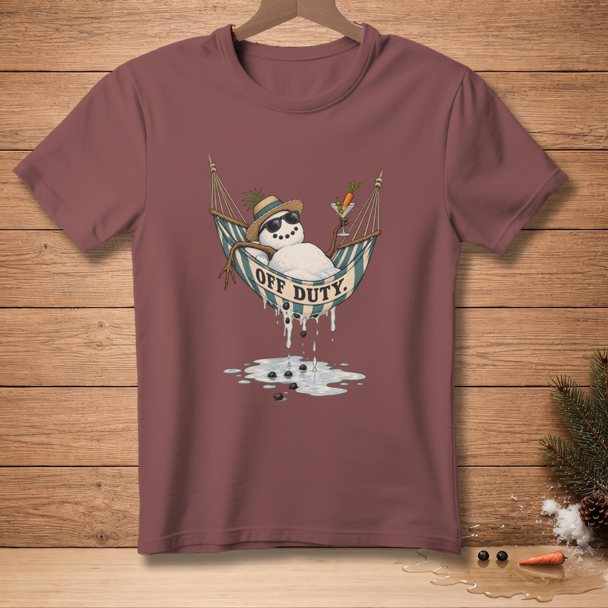 Snowman in a hammock wearing sunglasses and a hat with "Off Duty" text.