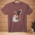 Ostrich with melting snowman and bucket of ice on maroon t-shirt graphic.