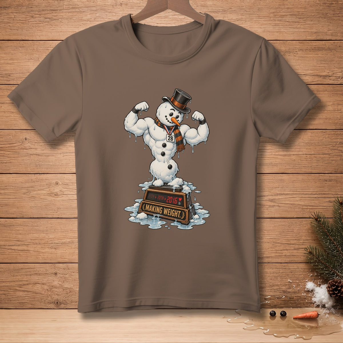 Muscular snowman with medal on weight scale displaying "MAKING WEIGHT"