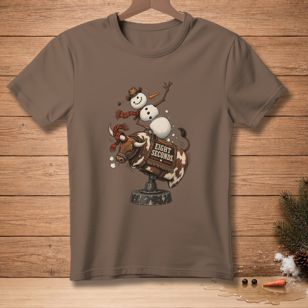 Snowman riding a bucking bull with "Eight Seconds" text on a brown t-shirt.