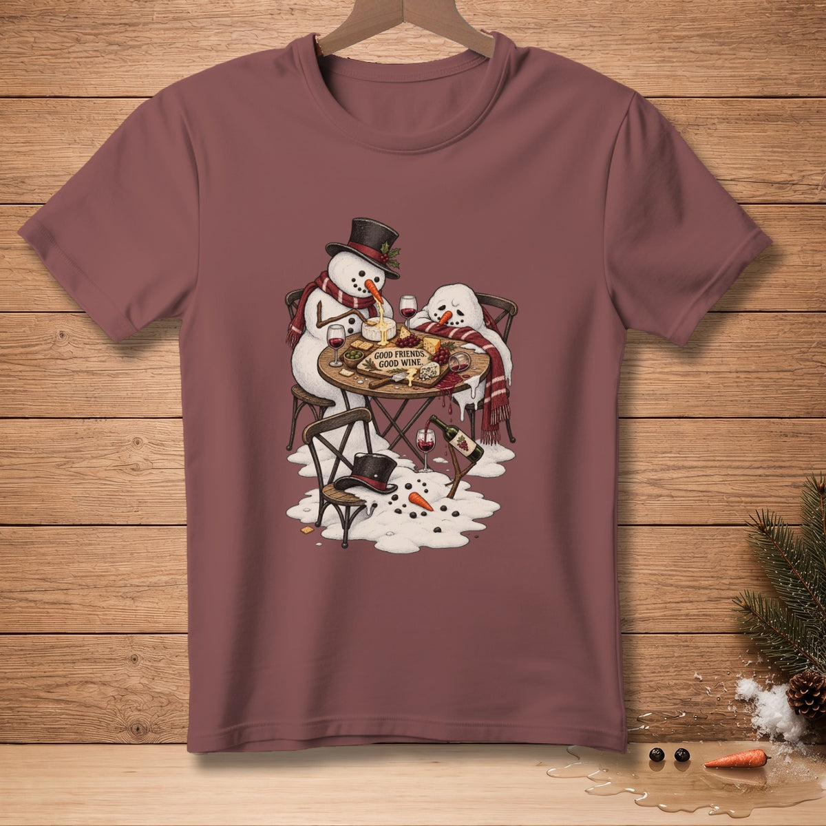 Two snowmen enjoy cheese and wine at a table with text "GOOD FRIENDS, GOOD WINE."