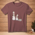 Snowmen transition from Miss Winter and Miss Spring to melting Miss July.