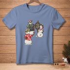 T-shirt with three snowmen playing darts, one holding a "Natural Talent" sign.