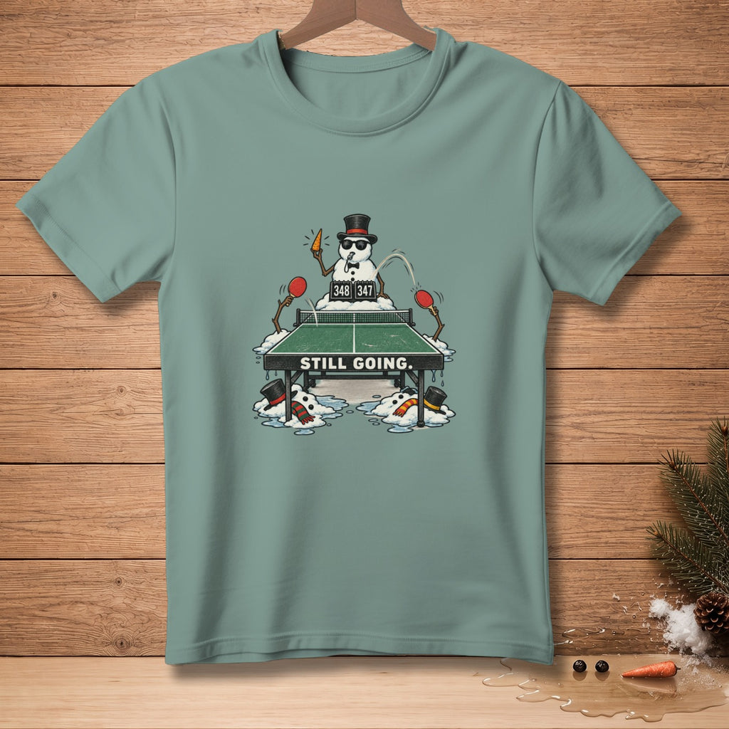 Snowman playing ping pong with score 348-347 and text "STILL GOING."