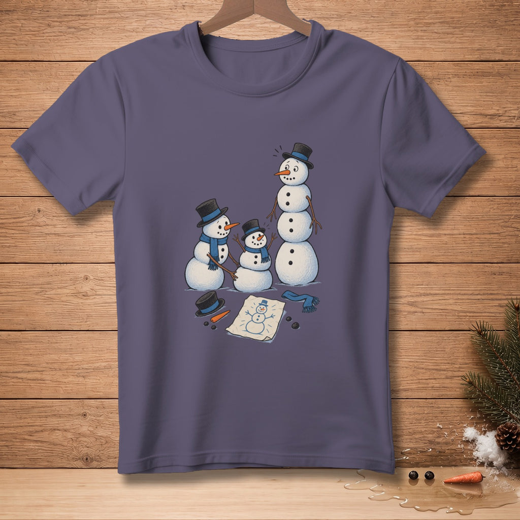 T-shirt with drawing of three snowmen, one tall and two smaller, surrounded by winter accessories.