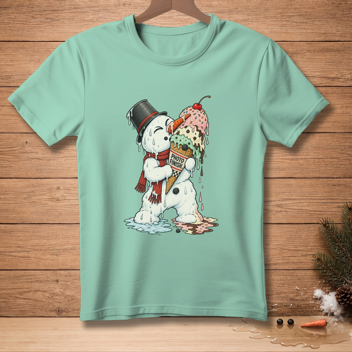 Mint green t-shirt with melting snowman holding melting ice cream cone labeled "Photo Finish".