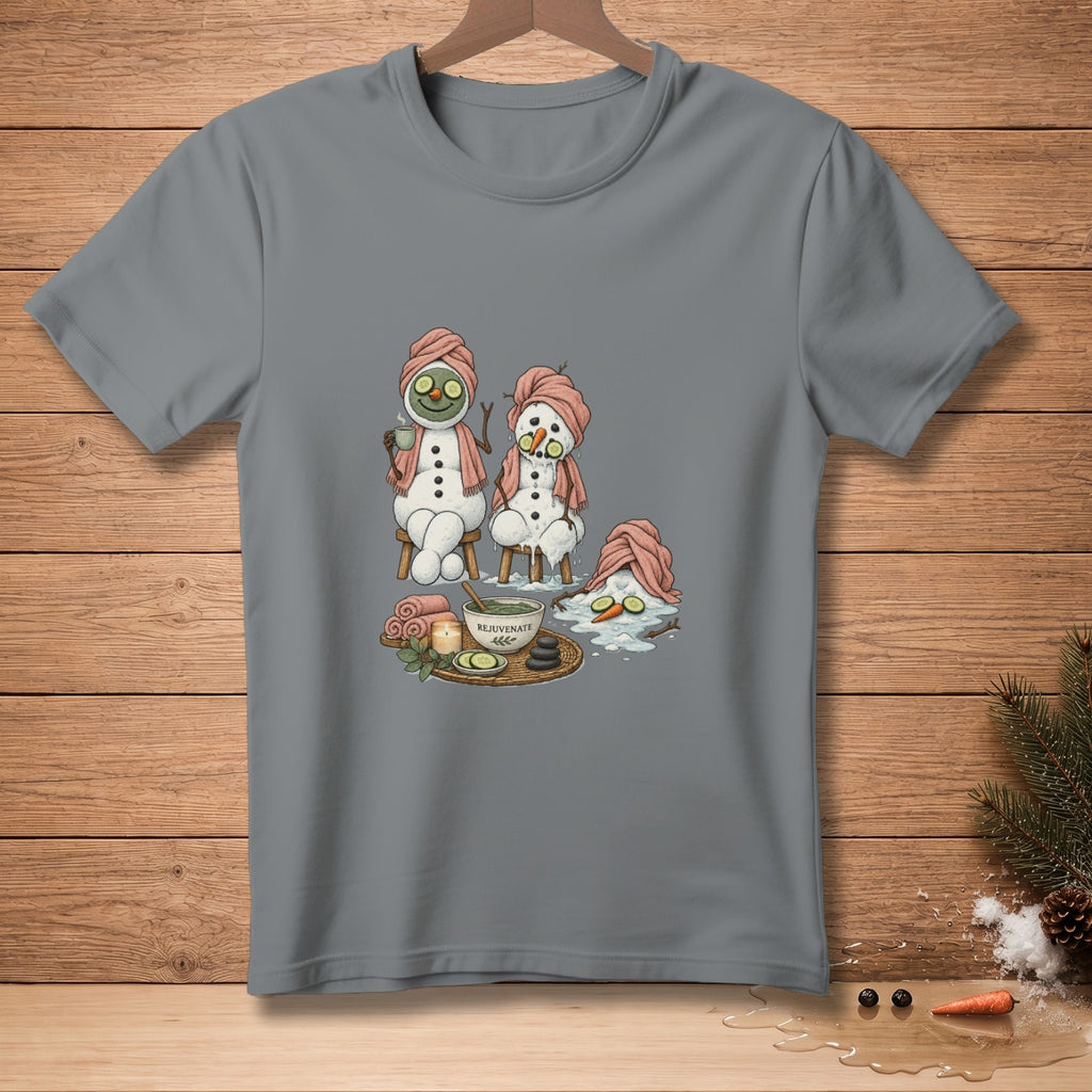 Snowmen in spa robes and cucumber eye masks with tea and spa items.