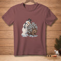 Snowman wearing top hat rests on porcupine with ice cubes on quills.
