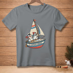 T-shirt graphic with snowmen sailing in a boat, text "CAPTAIN'S ORDERS."