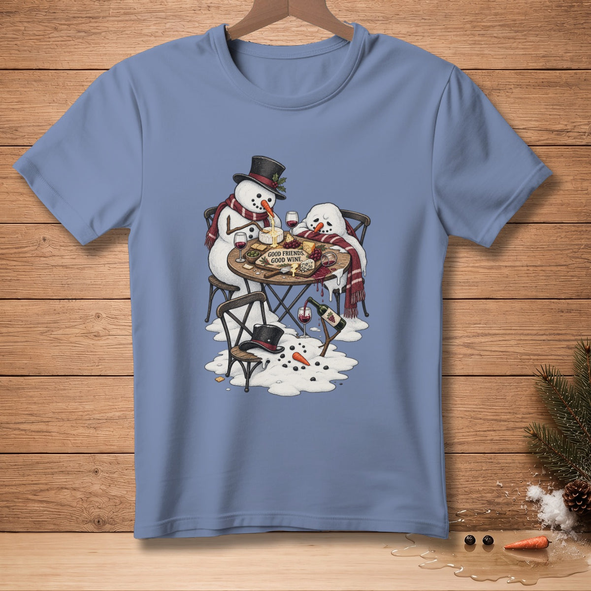 Snowmen enjoying cheese, wine, and saying "Good Friends, Good Wine" on a table.
