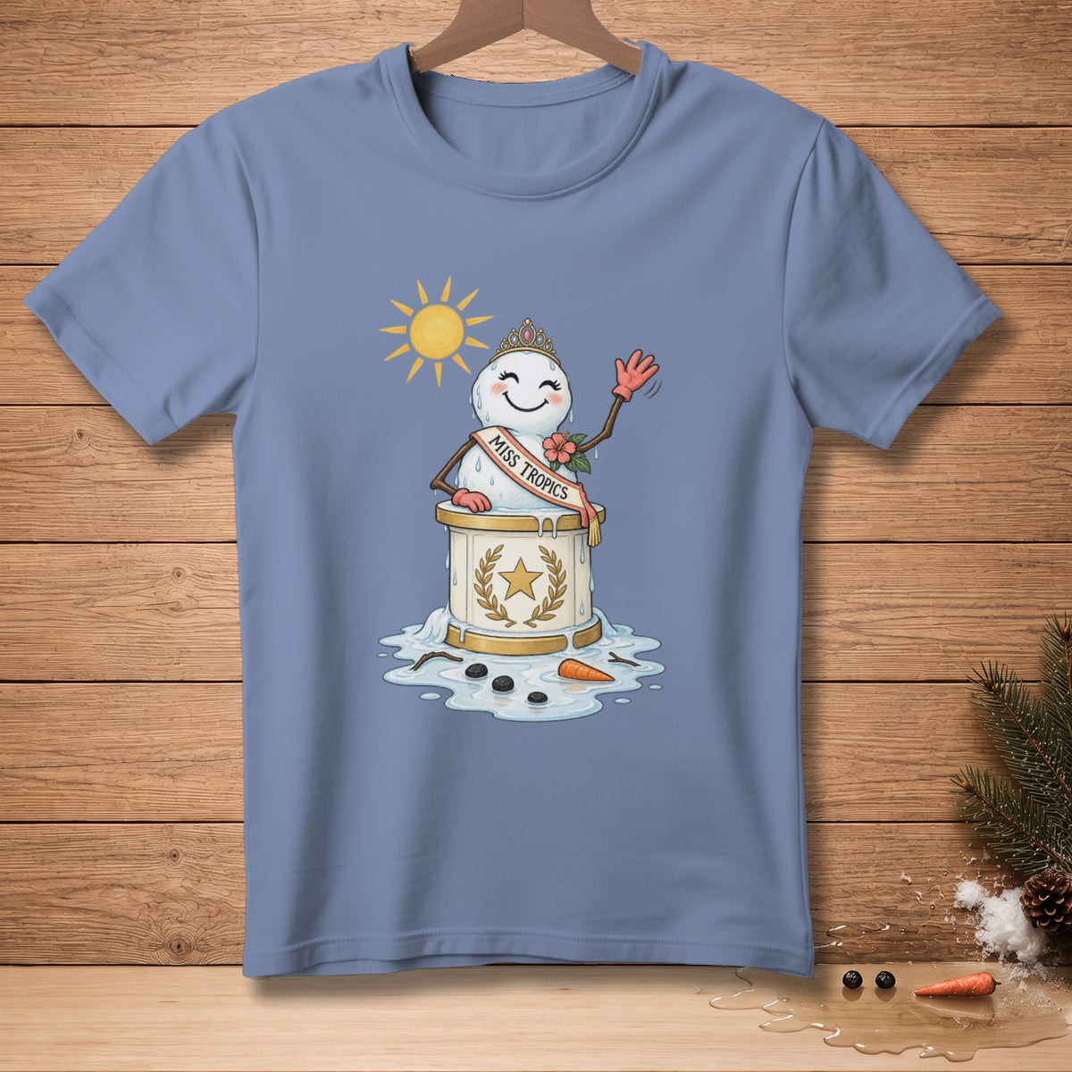 Snowman wearing "Miss Tropics" sash and crown, melting under the sun.