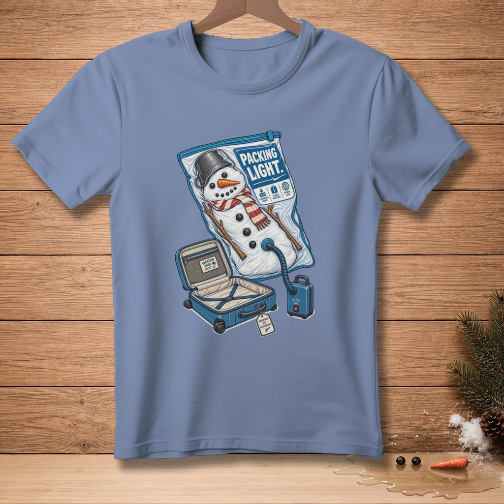 T-shirt with snowman vacuum-sealed in a bag with text "Packing Light" and a suitcase.