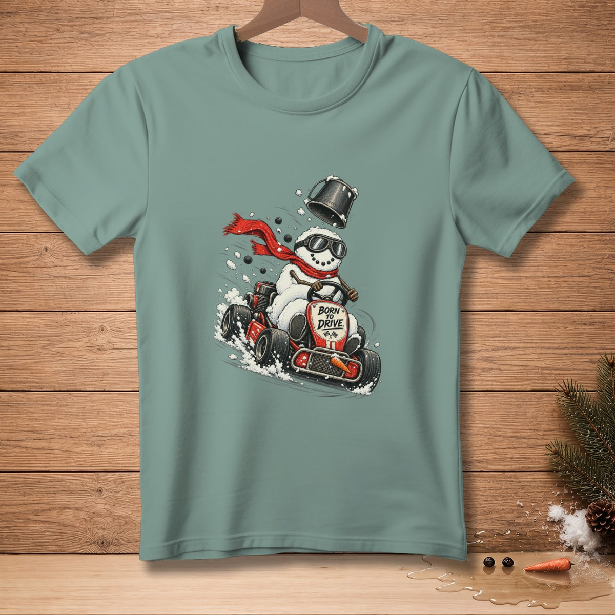 Snowman wearing goggles and scarf racing a go-kart, text "BORN TO DRIVE."