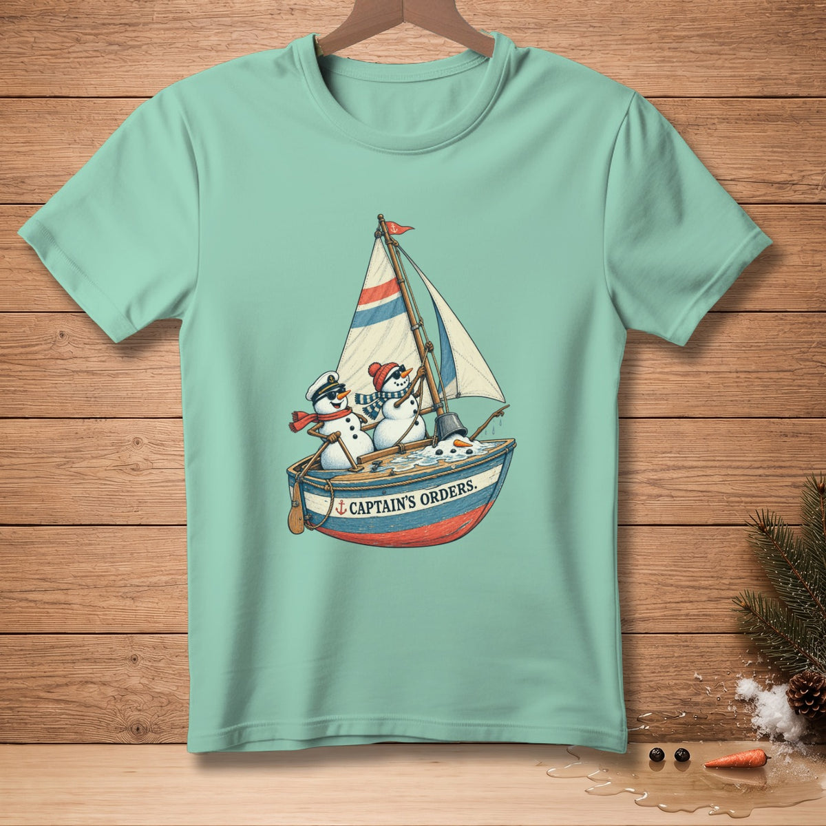Two snowmen in a sailboat with the text "CAPTAIN'S ORDERS."