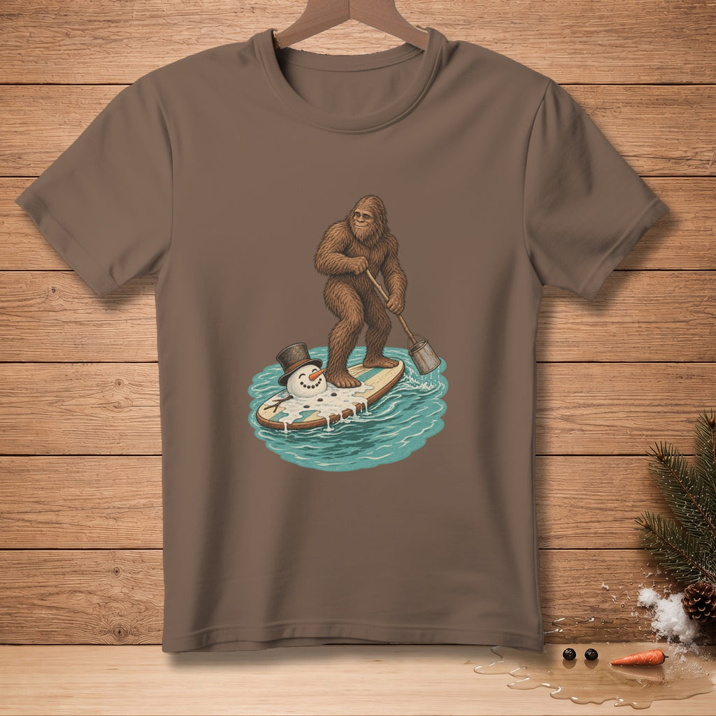 Bigfoot paddleboarding on a surfboard with a melting snowman.