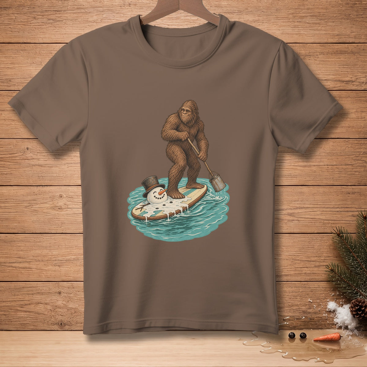 Bigfoot paddleboarding on a surfboard with a melting snowman.