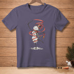 Snowman with ribbon, carrot nose, and text "Nailed the Routine" on a purple t-shirt.
