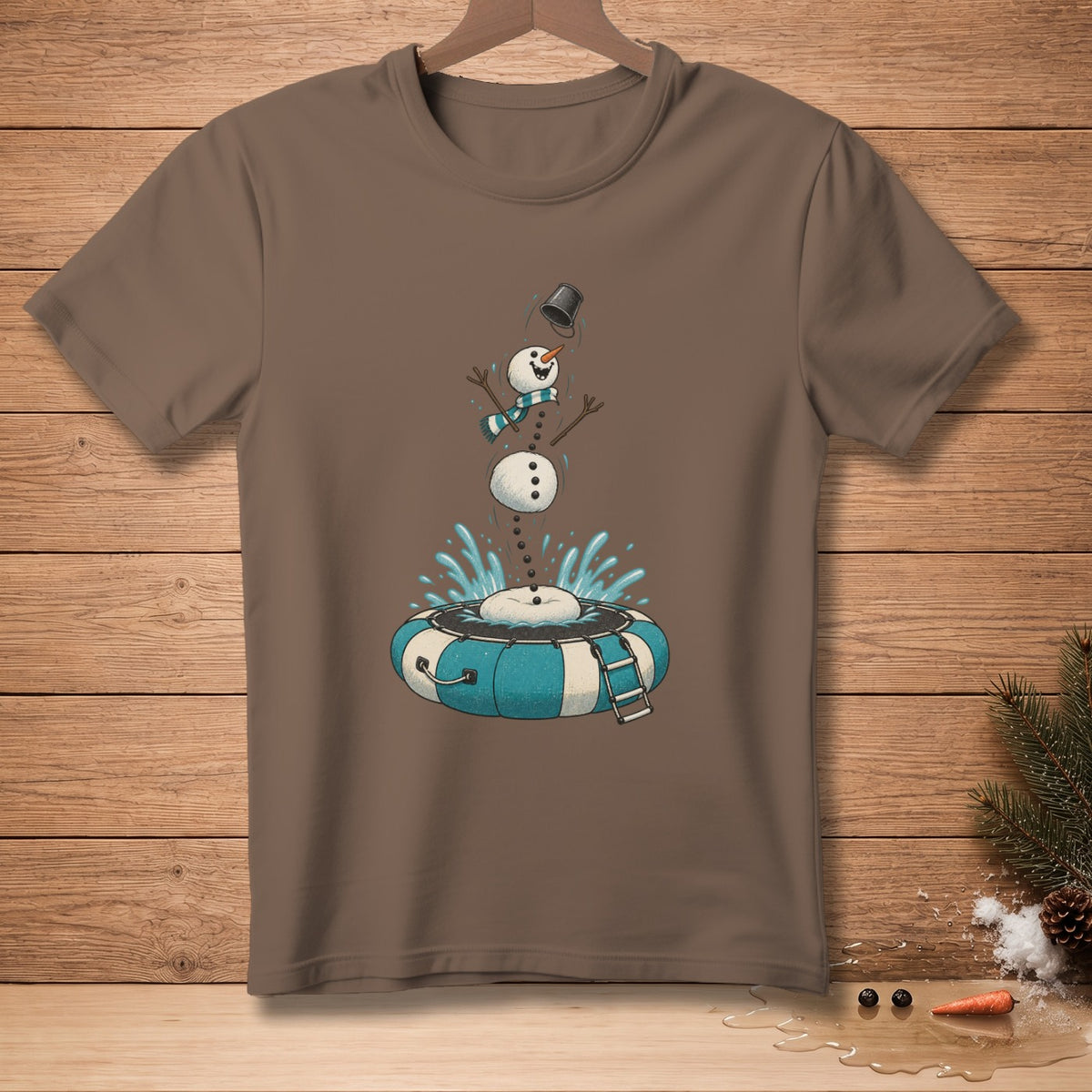 Snowman falling into inner tube with splashes of water, on brown t-shirt.