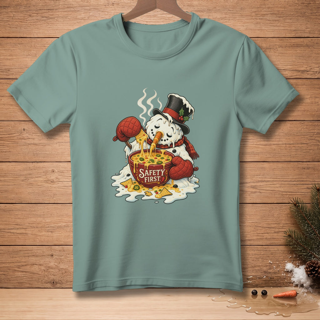 Snowman melting into cheese dip with "Safety First" bowl and nachos.