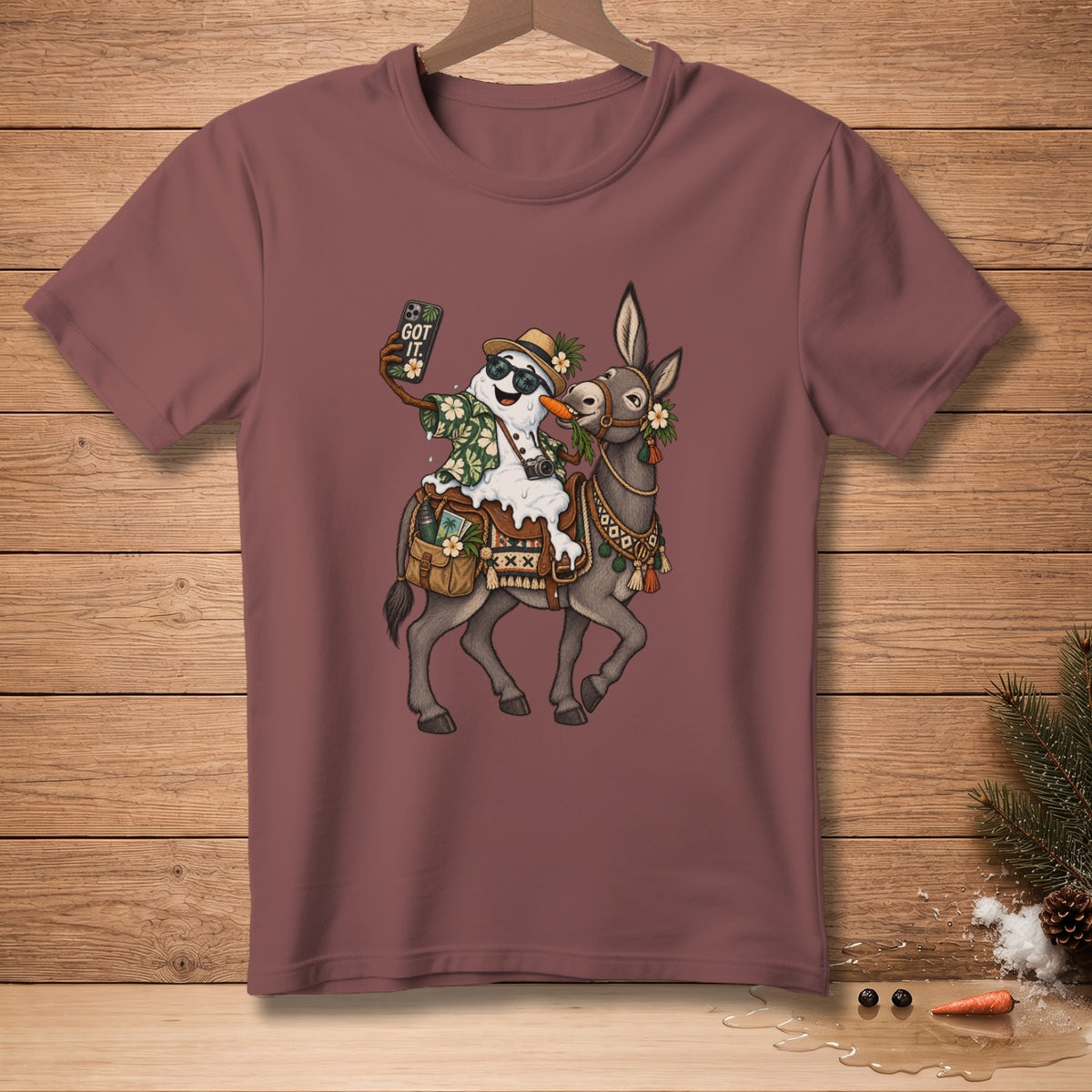 Snowman taking a selfie while riding a donkey with "GOT IT." text on phone.
