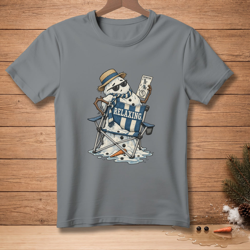Melting snowman in sunglasses and hat reads "INSTRUCTIONS" on t-shirt.