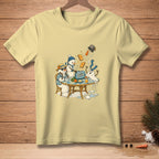 Snowmen at a table with a toaster ejecting toast and carrots.