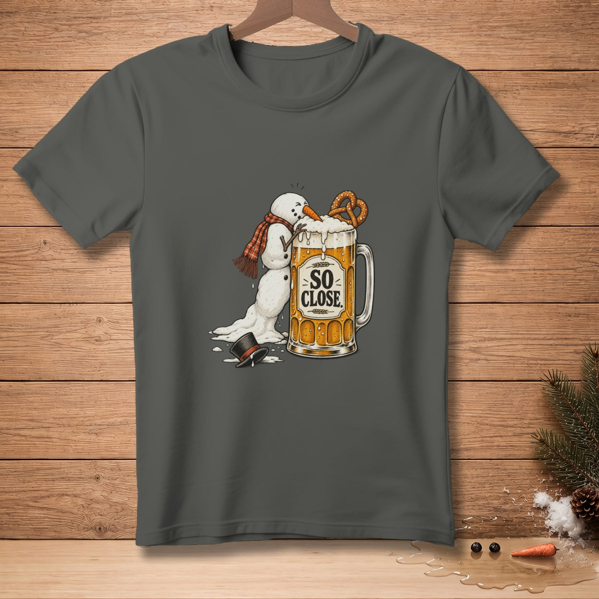 Melting snowman reaching for pretzel on beer mug with text "SO CLOSE."