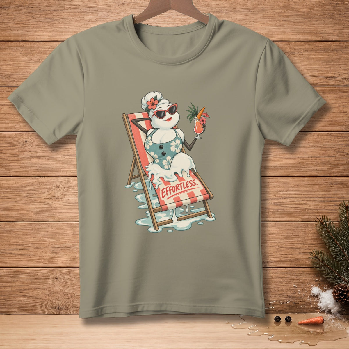 Snowman in a bikini lounging on a beach chair, text "EFFORTLESS."