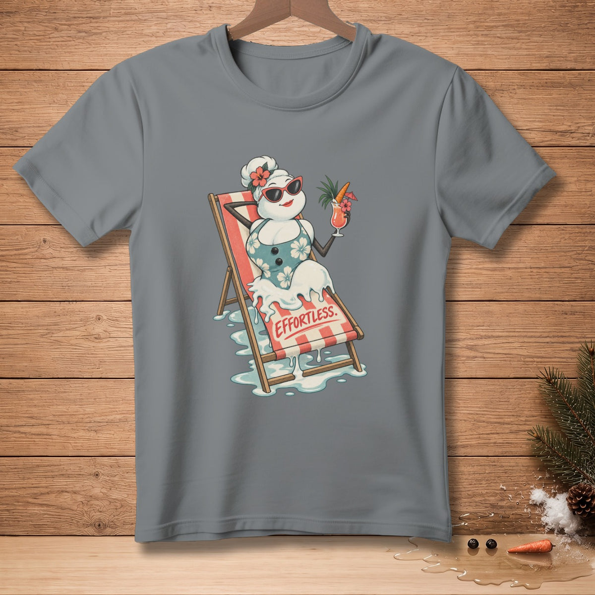 Melting snowman in swimsuit on lounge chair, holding a drink, with "EFFORTLESS" text.