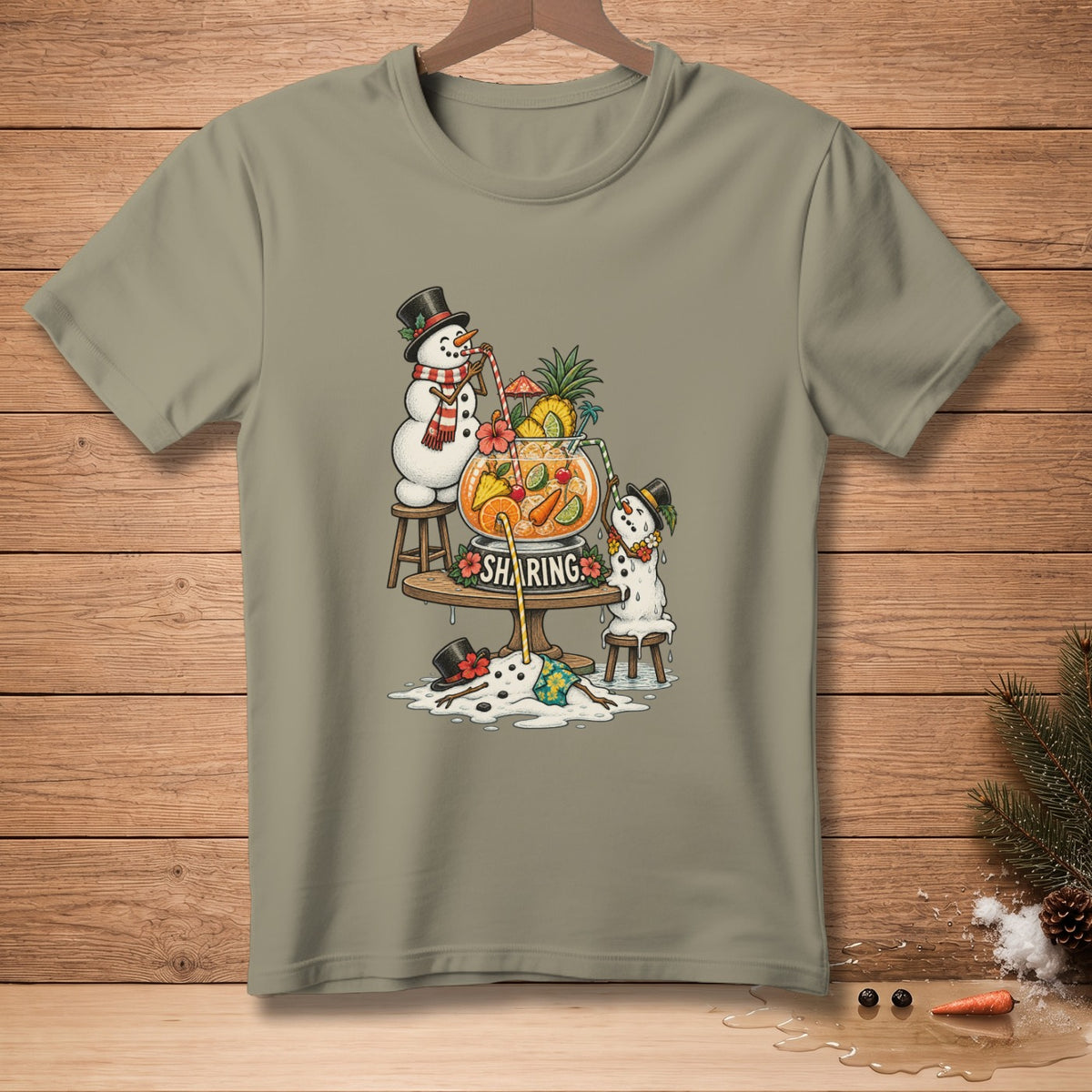 T-shirt graphic with snowmen sharing a tropical punch bowl, text reads "SHARING".