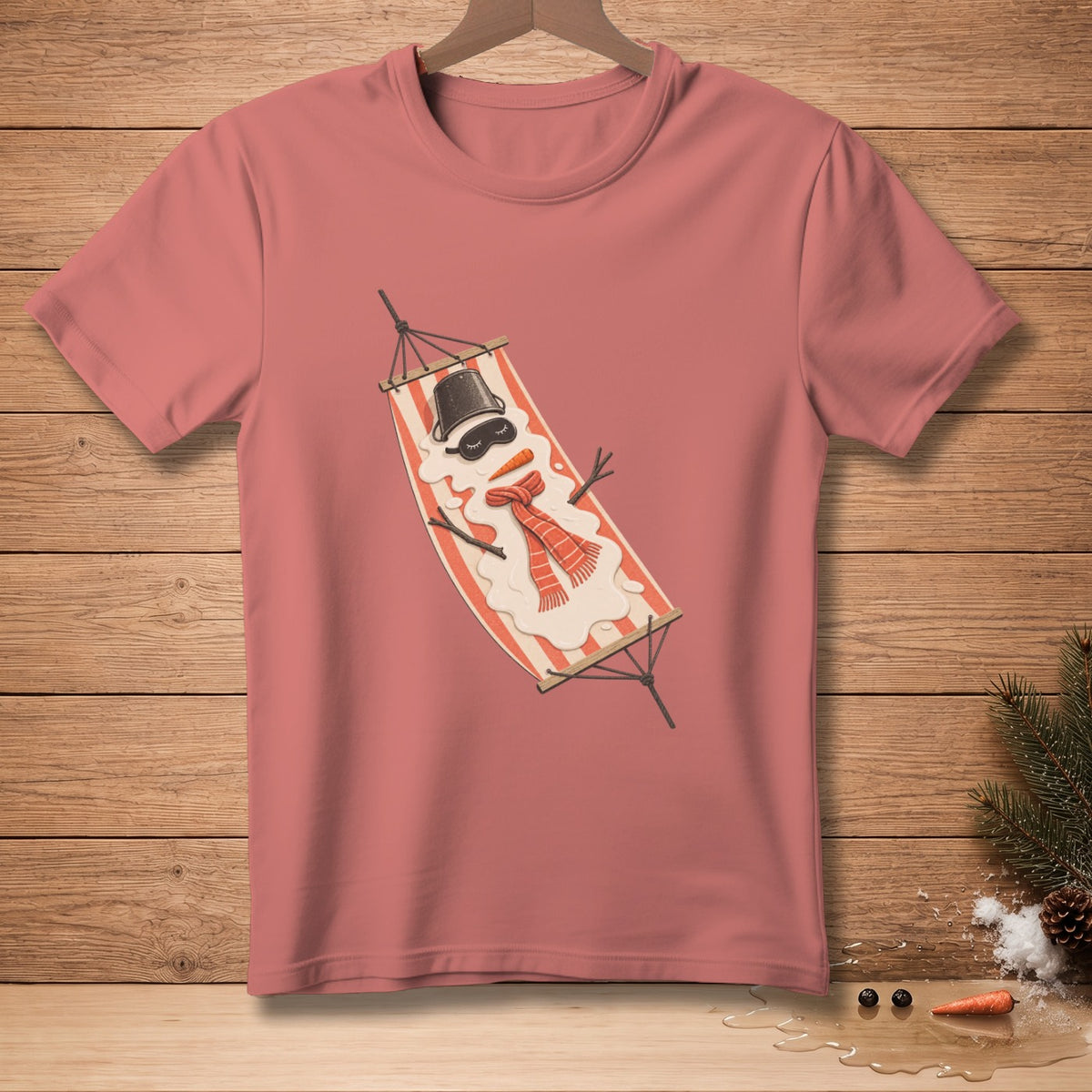Melting snowman in a hammock with a scarf and bucket hat.